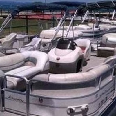 a boat parked next to a body of water