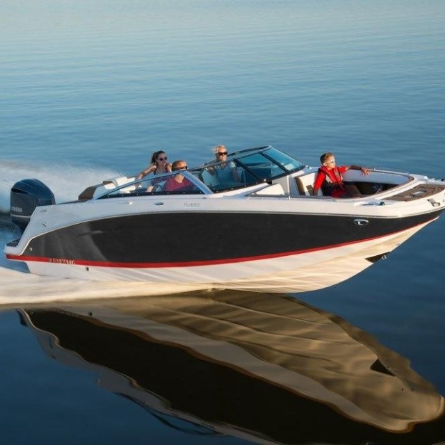 a small boat in a body of water